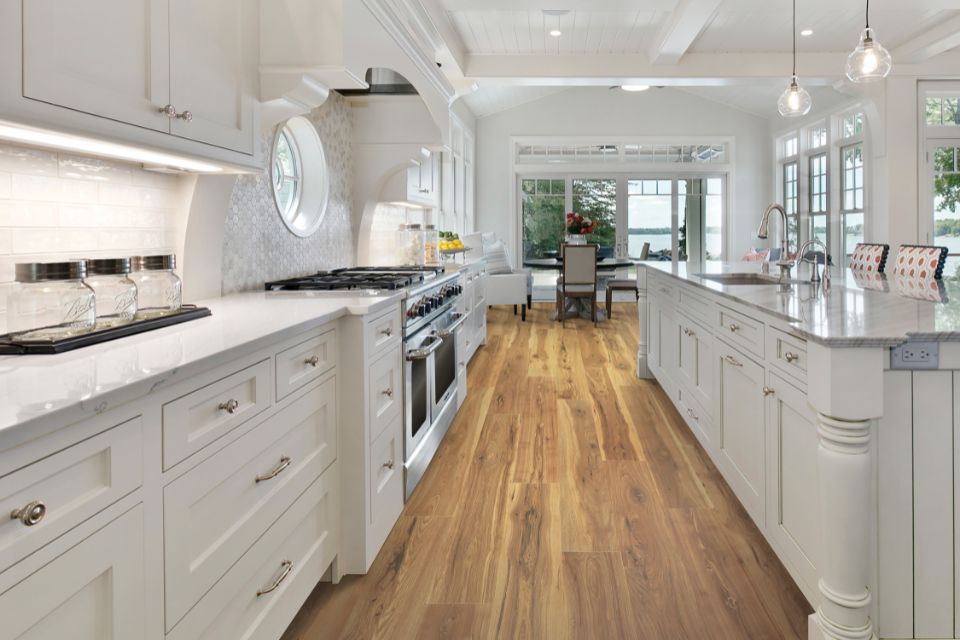 laminate farmhouse flooring in all white kitchen